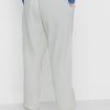 Beigefarbene Jogginghose mit seitlichen Streifen von Ralph Lauren für Damen Beigefarbene Jogginghose mit seitlichen Streifen von Ralph Lauren für Damen