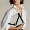 Creme/Schwarze Umhängetaschen aus Wildleder von Ralph Lauren für Damen mit Polo-ID-Umschlag Creme/Schwarze Umhängetaschen aus Wildleder von Ralph Lauren für Damen mit Polo-ID-Umschlag