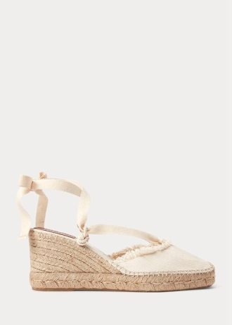Cremefarbene flache Keilschuhe aus Canvas mit Fransenbesatz für Damen von Ralph Lauren