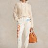 Cremefarbene Fleece-Jogginghose mit Ralph Lauren-Logo und Wellengrafik für Damen Cremefarbene Fleece-Jogginghose mit Ralph Lauren-Logo und Wellengrafik für Damen