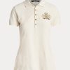 Cremefarbene Poloshirts aus Piqué mit Perlenwappen von Ralph Lauren für Damen Cremefarbene Poloshirts aus Piqué mit Perlenwappen von Ralph Lauren für Damen